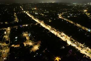 High Angle View of Luton City and Road with Some Traffic During Midnight. photo