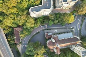 Aerial View of British Tourist Attraction of Bournemouth Beach and Sea view City of England Great Britain UK. Image Captured with Drone's Camera on September 9th, 2023 During Sunset photo