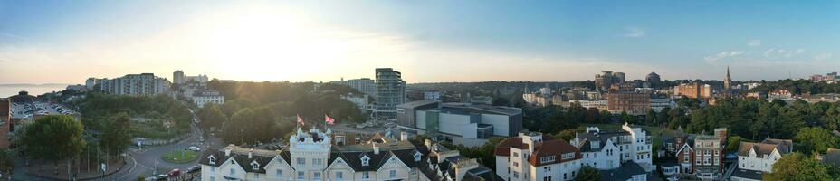 Aerial Panoramic View of British Tourist Attraction at Sea View of Bournemouth City of England Great Britain UK. High Angle Image Captured with Drone's Camera on September 9th, 2023 During Sunset photo