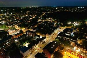 Aerial View of Illuminated Downtown Buildings, Roads and Central Luton City of England UK at Beginning of Clear Weather Night of September 5th, 2023 photo