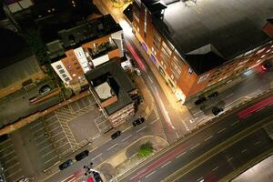 aéreo ver de iluminado céntrico edificios, carreteras y central lutón ciudad de Inglaterra Reino Unido a comenzando de claro clima noche de septiembre 5to, 2023 foto