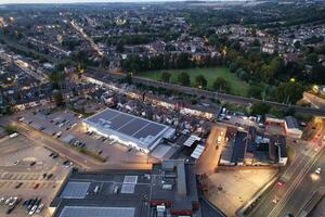 Aerial View of Illuminated Downtown Buildings, Roads and Central Luton City of England UK at Beginning of Clear Weather Night of September 5th, 2023 photo