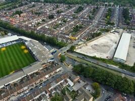 Aerial View of Residential Real Estate with Industrial Estate Combined District of North of Luton City of England, Great Britain, UK.  Footage Was Captured with Drone's Camera on September 7th, 2023 photo