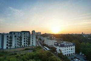 Aerial View of British Tourist Attraction of Bournemouth Beach and Sea view City of England Great Britain UK. Image Captured with Drone's Camera on September 9th, 2023 During Sunset photo