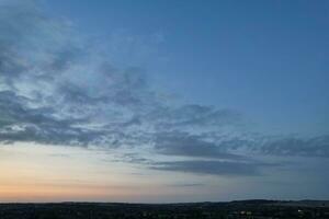 Most Beautiful View of Sky and Dramatic Clouds over Luton City of England UK During Sunset. photo