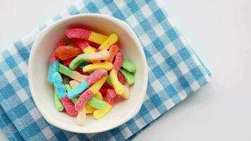 colorful candy sweet jelly in a bowl on table video