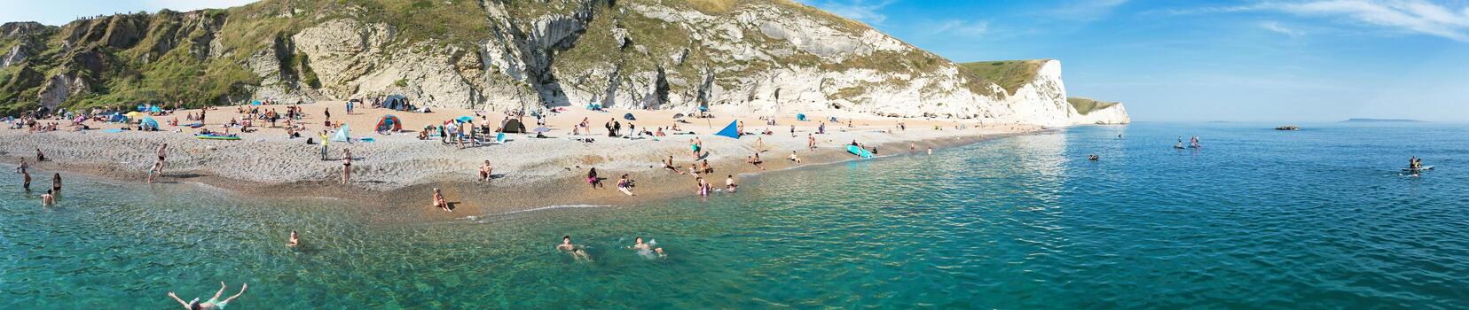 Most Beautiful High Angle View of British Landscape and Sea View of Durdle Door Beach of England Great Britain, UK. Image Was captured with Drone's camera on September 9th, 2023 photo