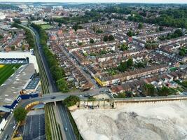 Aerial View of Residential Real Estate with Industrial Estate Combined District of North of Luton City of England, Great Britain, UK.  Footage Was Captured with Drone's Camera on September 7th, 2023 photo