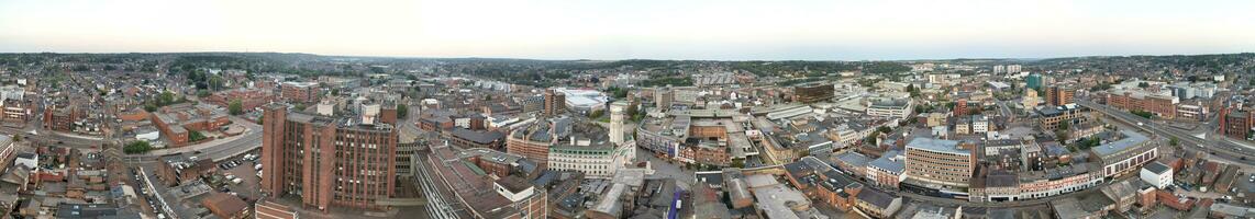 Ultra Wide Aerial Panoramic View of Illuminated Downtown Buildings, Roads and Central Luton City of England UK at Beginning of Clear Weather's Night of September 5th, 2023 photo