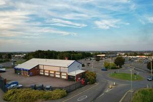 Aerial View of Residential Real Estate with Industrial Estate Combined District of North of Luton City of England, Great Britain, UK.  Footage Was Captured with Drone's Camera on September 7th, 2023 photo