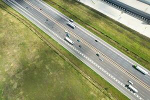 High Angle View of British Motorways and Highways and Traffic on M1 Junction 11a of Luton and Dunstable England UK. Image Was Captured on August 15th, 2023 photo