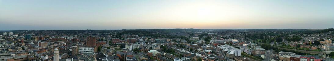 Ultra Wide Aerial Panoramic View of Illuminated Downtown Buildings, Roads and Central Luton City of England UK at Beginning of Clear Weather's Night of September 5th, 2023 photo