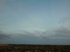 High Angle view of Beautiful Clouds and Sky over Luton City During Sunset photo