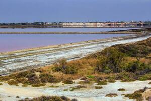 Salt evaporation ponds, Salin-de-Giraud, Camargue, France photo