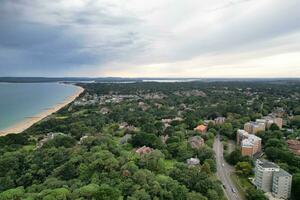 Ariel Footage of Attractive Tourist Destination at Bournemouth City Sandy Beach and Ocean of England Great Britain, Aerial Footage Captured with Drone's Camera on August 23rd, 2023 During sunny Day. photo