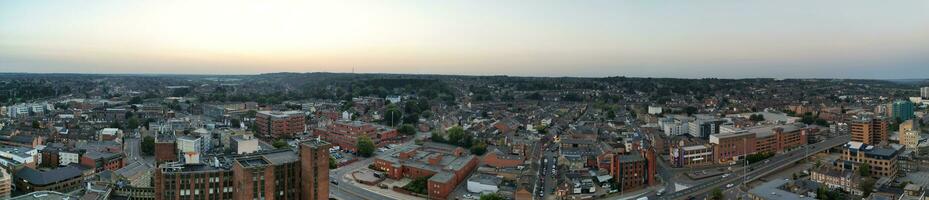 Ultra Wide Aerial Panoramic View of Illuminated Downtown Buildings, Roads and Central Luton City of England UK at Beginning of Clear Weather's Night of September 5th, 2023 photo