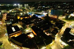 Aerial View of Illuminated Downtown Buildings, Roads and Central Luton City of England UK at Beginning of Clear Weather Night of September 5th, 2023 photo