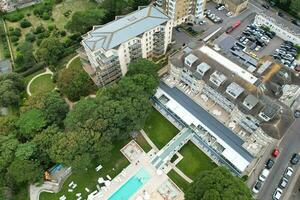 Ariel Footage of Attractive Tourist Destination at Bournemouth City Sandy Beach and Ocean of England Great Britain, Aerial Footage Captured with Drone's Camera on August 23rd, 2023 During sunny Day. photo