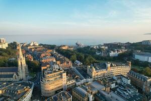 Beautiful Aerial Footage of British Tourist Attraction at Sea View of Bournemouth City of England Great Britain UK. High Angle Image Captured with Drone's Camera on September 9th, 2023 During Sunset photo