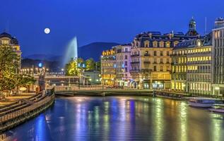 Urban view with famous fountain, Geneva, Switzerland, HDR photo