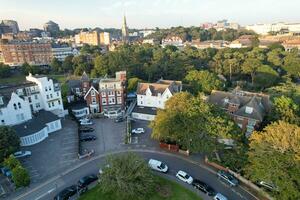 Aerial View of British Tourist Attraction of Bournemouth Beach and Sea view City of England Great Britain UK. Image Captured with Drone's Camera on September 9th, 2023 During Sunset photo