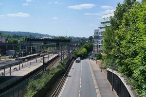Low Angle View of Central luton City and Downtown Buildings Near Central Railway Station of Luton Town, England Great Britain UK. The Image Captured on Clear sunny Day of June 2nd, 2023 photo
