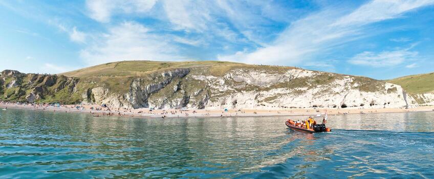 Most Beautiful High Angle View of British Landscape and Sea View of Durdle Door Beach of England Great Britain, UK. Image Was captured with Drone's camera on September 9th, 2023 photo