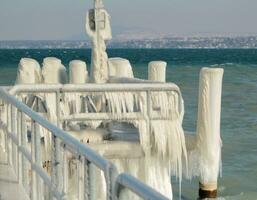 Pontoon by winter, Versoix, Switerland photo