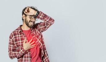 Man with heart pain on isolated background, man with chest pain, on isolated background, tachycardia photo