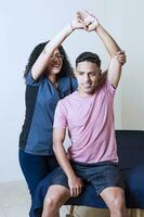 shoulder and elbow physical therapy, shoulder assessment physical therapist, elbow rehabilitation physical therapy, photo