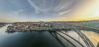 Drone panorama over the city of Porto and the Douro River at sunrise photo