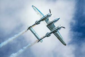 Old timer warbird at air base and airfield. Cold war and World War aviation. Airshow display. Aged military aircraft. Fly and flying. photo