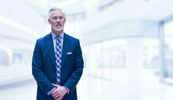 Senior businessman in his office photo