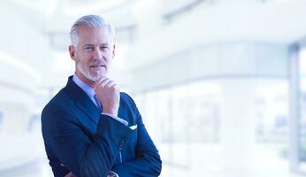 Senior businessman in his office photo