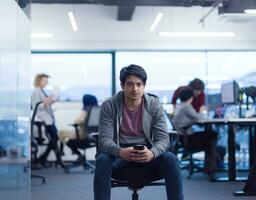 software developer using mobile phone photo