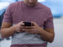 software developer using mobile phone photo