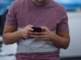 software developer using mobile phone photo