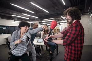 multiethnics business team boxing at office photo