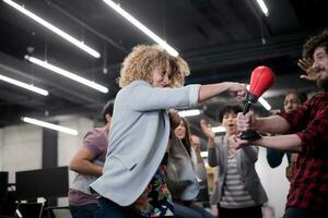 multiethnics business team boxing at office photo