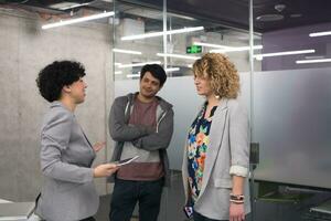 Startup business team at a meeting in modern office building photo