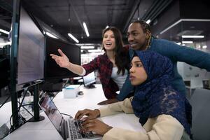 multiethnics team of software developers working together photo