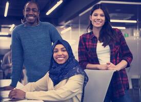 multiethnics team of software developers working together photo