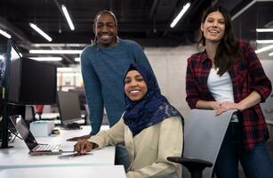 multiethnics team of software developers working together photo