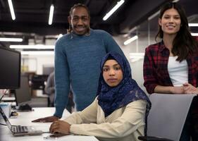 multiethnics team of software developers working together photo