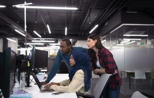 multiethnics team of software developers working together photo