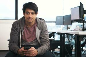 software developer using mobile phone photo