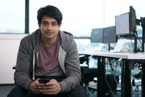 software developer using mobile phone photo