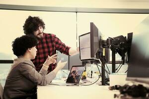 software developers couple writing programming code photo