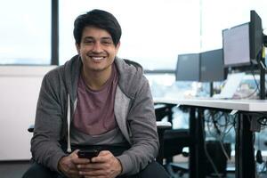 software developer using mobile phone photo