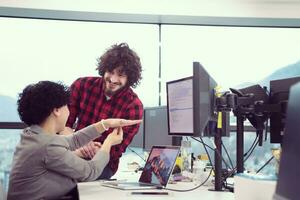 software developers couple writing programming code photo